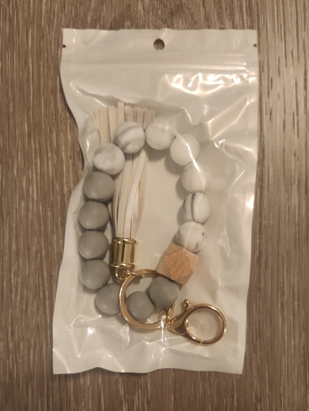 Stylish Gray & White Beaded Wristlet Keychain with Gold Hardware And Tassle